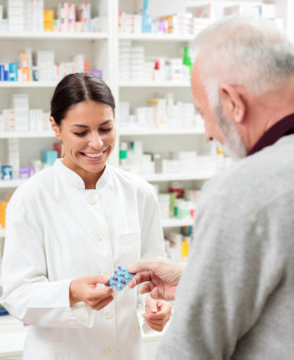 pharmacist smiling on customer