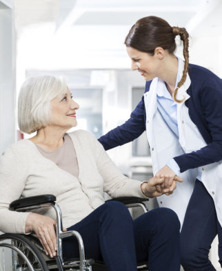 smiling senior looking at pharmacist