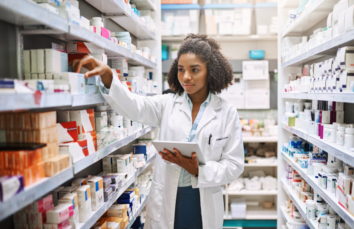 pharmacist intern looking at medicines