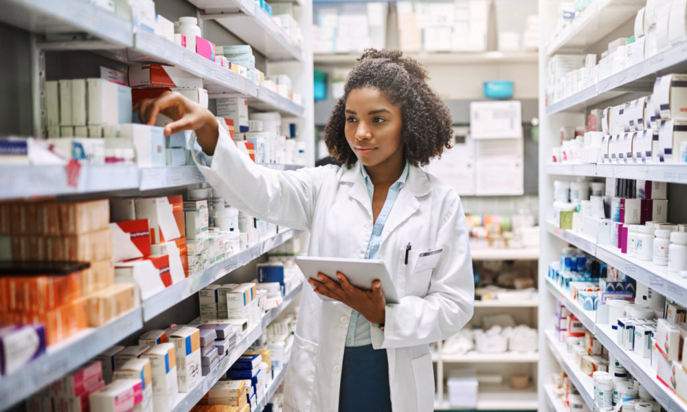 pharmacist intern looking at medicines